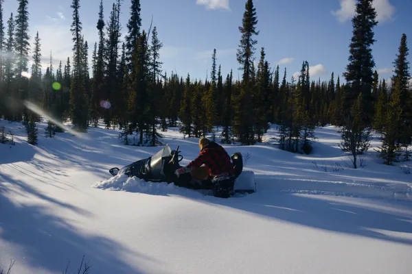 A snow machine in deep snow